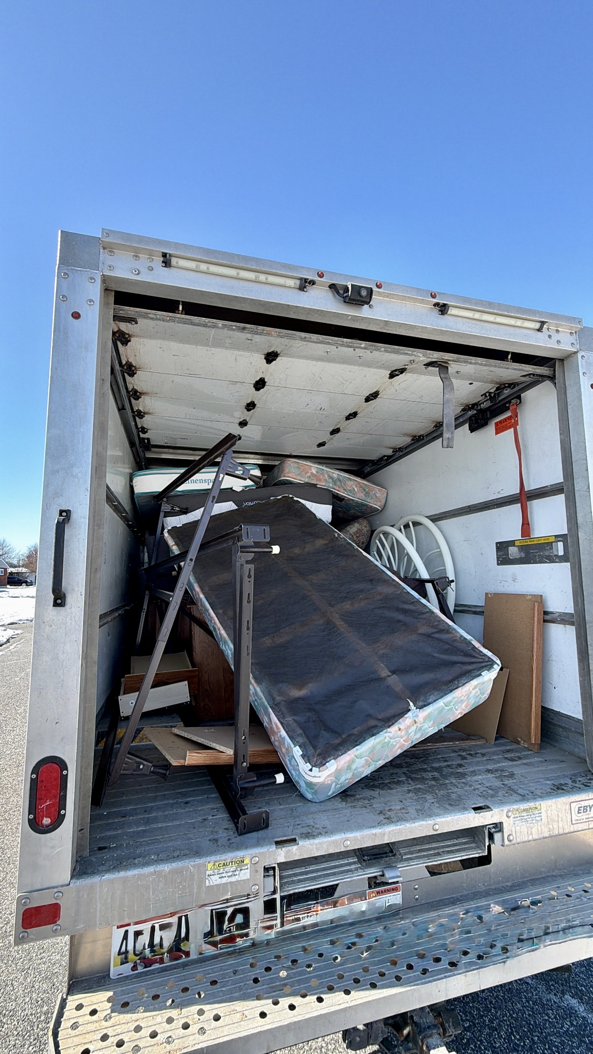 Overhead view of a neatly packed and full hauling truck